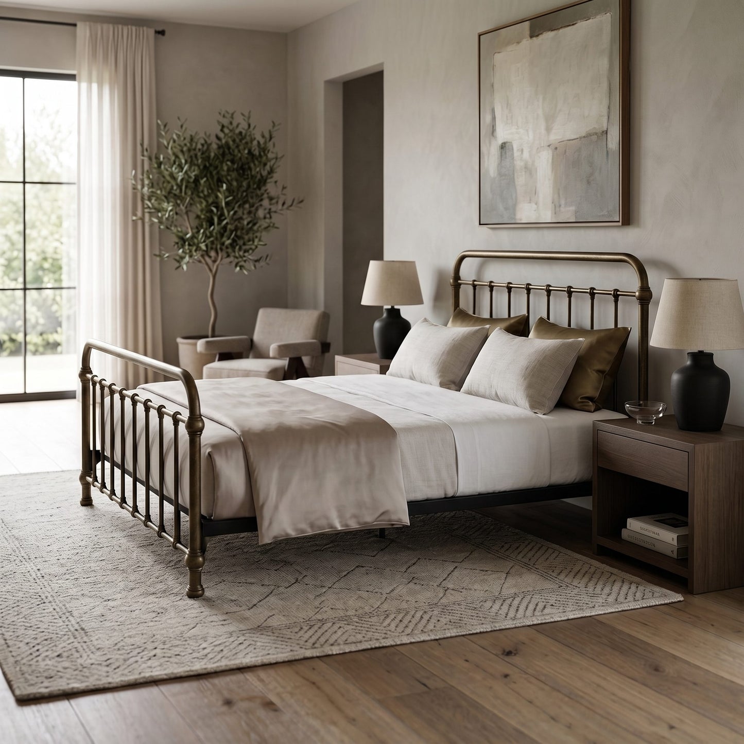 Heiressy 20th c Americana Iron Bed in Restored Brass Finish. A classic metal bed frame with an antique bronze finish, styled in a neutral-toned bedroom with white linens, matching nightstands, and a large area rug.