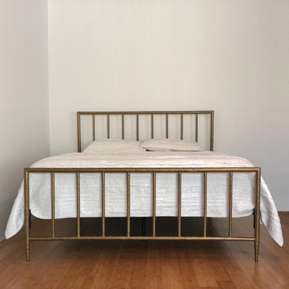 Archaeo Pitted Brass Hammered Iron Platform Bed by Heiressy organic modern contemporary furniture.